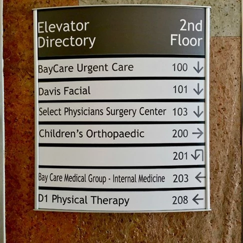Custom Indoor Directory with Curved Frame and Changeable Copy Inserts