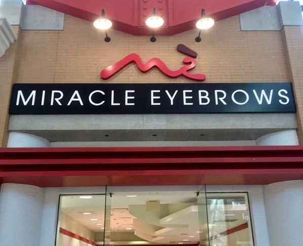 Custom Channel Letters for Miracle Eyebrows - Push Through LED Illuminated Acrylic Letters and Custom Cut Aluminum Logo at Westfield Citrus Park Mall